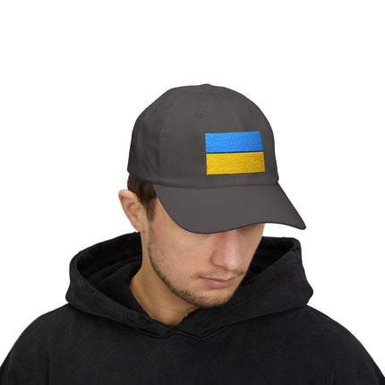 Black baseball cap featuring embroidered Ukrainian flag for support and pride.