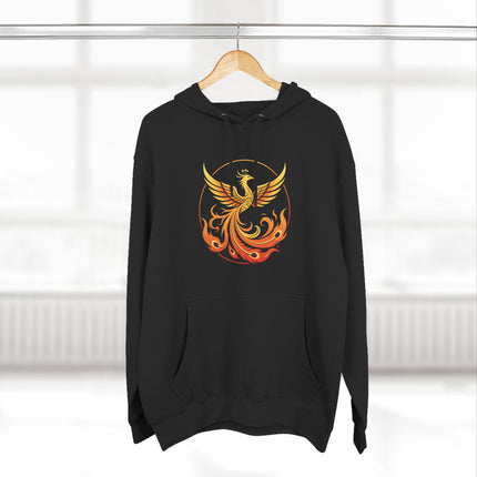 Fiery phoenix graphic on a black hoodie. Mythological rebirth symbol of resilience.