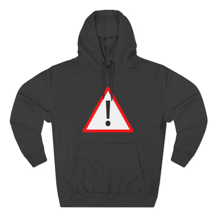 Red warning sign exclamation mark graphic on a black pullover hoodie.