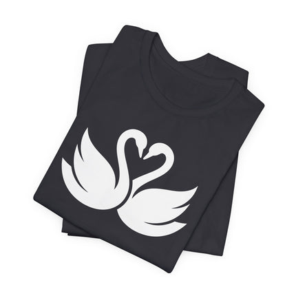 Swans forming a heart graphic on a black t-shirt, symbolizing love and romance.