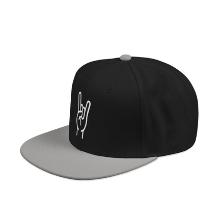 Embroidered sign of the horns snapback cap in black and white.