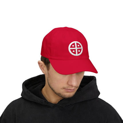Red baseball cap featuring a white embroidered solar cross symbol.