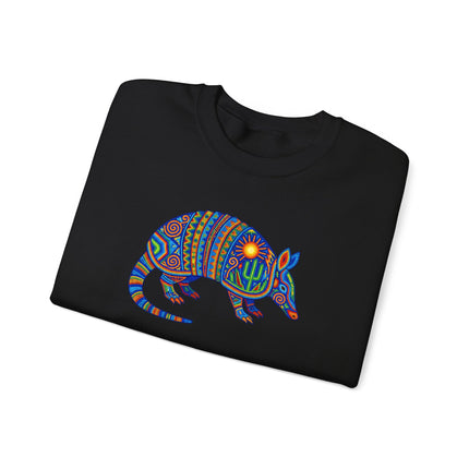 Vibrant pullover featuring a Huichol armadillo design in traditional dotted Mexican folk art style.