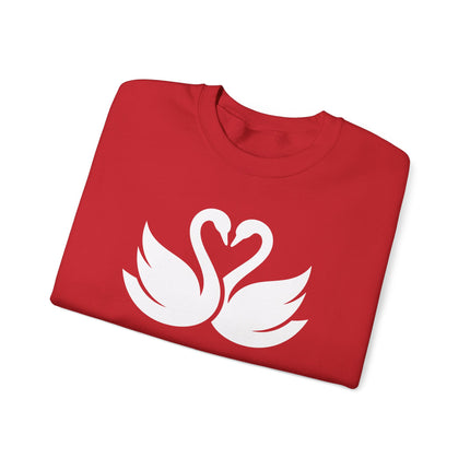 Swans forming a heart on a cozy couple's pullover sweatshirt for romantic gifts.