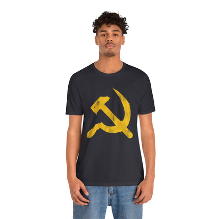 Yellow graffiti hammer and sickle symbol on a black streetwear t-shirt.