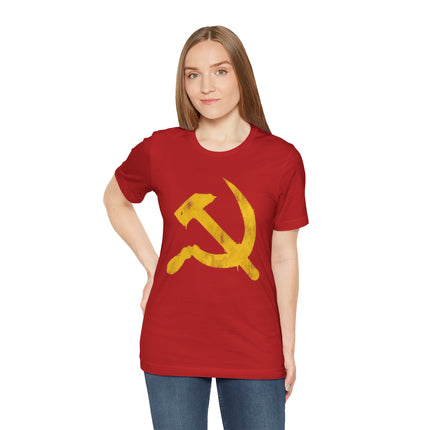 Red t-shirt featuring yellow graffiti hammer and sickle communist symbol.