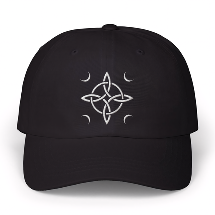 Embroidered witch's knot and crescent moons on a black dad hat.