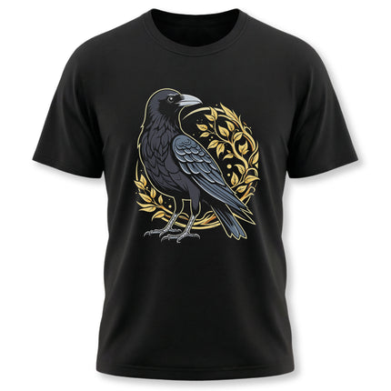 Black t-shirt featuring a stylized raven graphic surrounded by golden leaves and foliage. Norse mythology design.