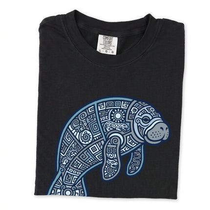 Geometric Mayan manatee tribal design t-shirt featuring an ocean animal motif.