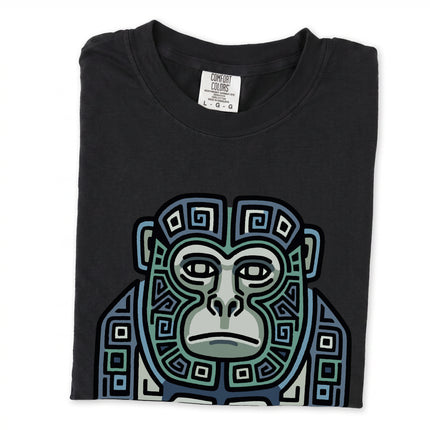 Blue and green Mayan monkey tribal art t-shirt featuring geometric ape design.