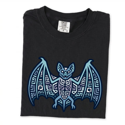 Geometric Mayan bat symbol tribal graphic printed on an indigo blue t-shirt.