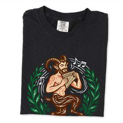 Pan flute satyr graphic tee featuring Greek god mythology art on a comfort colors shirt.