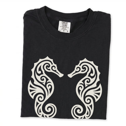 Ornate tribal seahorse marine life design printed on a unisex t-shirt.