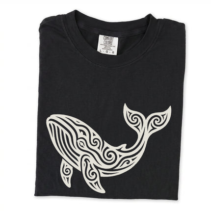Intricate tribal whale graphic tee featuring detailed ocean animal artwork on a comfortable t-shirt.