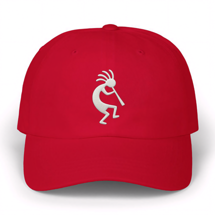 Red baseball cap with embroidered Kokopelli figure playing a flute.