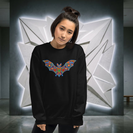 Vibrant Huichol folk art bat design on a Mexican pullover sweatshirt.