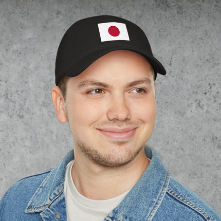 Red sun Japanese flag design on a white baseball cap.