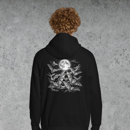 Gothic hoodie featuring flying bats and a crescent moon graphic against a dark, starry night sky print.