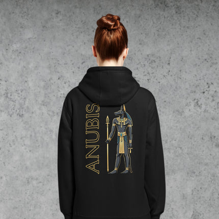 Anubis Egyptian god graphic printed on the back of a black pullover hoodie.