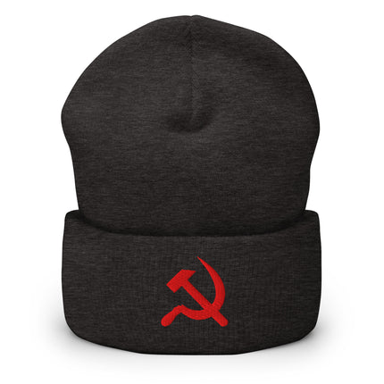 Red embroidered beanie with hammer and sickle emblem.