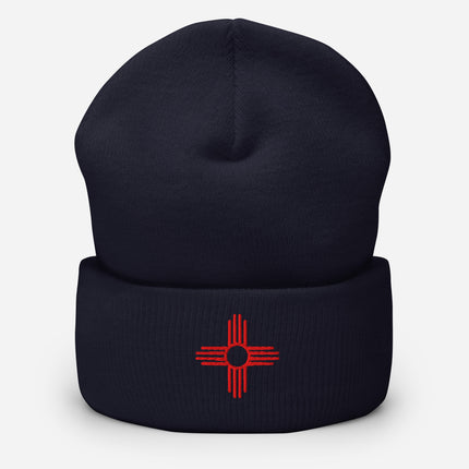 Zia Sun embroidered beanie with red directional symbol cuff.