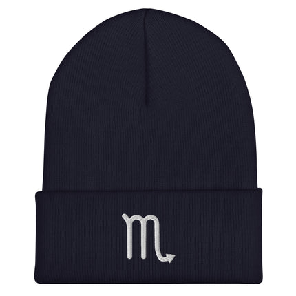 Black beanie with embroidered white Scorpio glyph symbol.