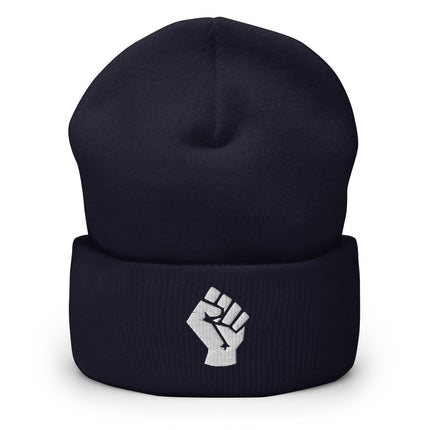 Embroidered white raised fist symbol on a black socialist beanie.