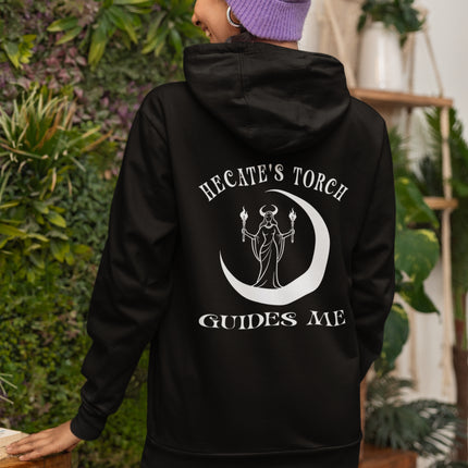 Hecate's Torch Goddess graphic on black hoodie, featuring a crescent moon and "Guides Me.