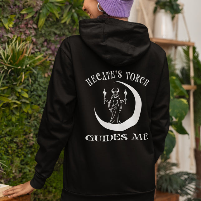 Hecate's Torch Goddess graphic on black hoodie, featuring a crescent moon and "Guides Me.