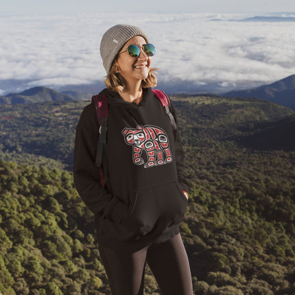 Pacific Northwest tribal bear formline art graphic on a black pullover hoodie.