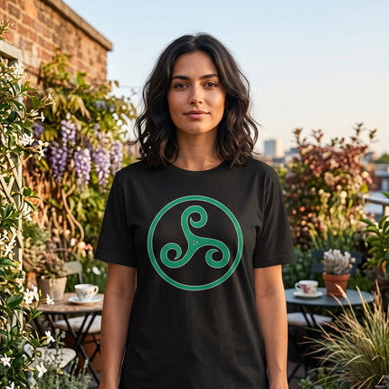 Green Celtic Triskele triple spiral symbol on a black graphic t-shirt.
