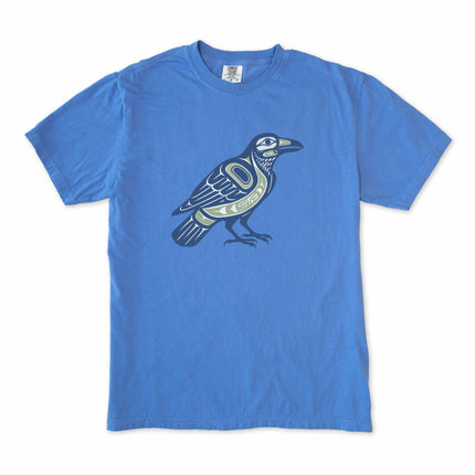 Raven graphic t-shirt featuring Inuit inspired symbolism and Indigenous Pacific Northwest art style.