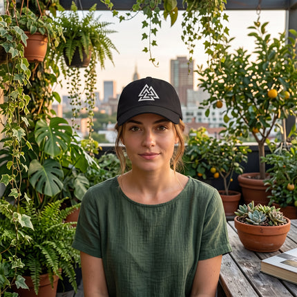 Black baseball cap with embroidered Norse Valknut symbol.