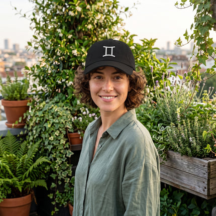 Black embroidered Gemini zodiac symbol dad hat.