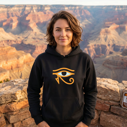 Black pullover hoodie featuring the Eye of Horus graphic. Ancient Egyptian protection symbol apparel.