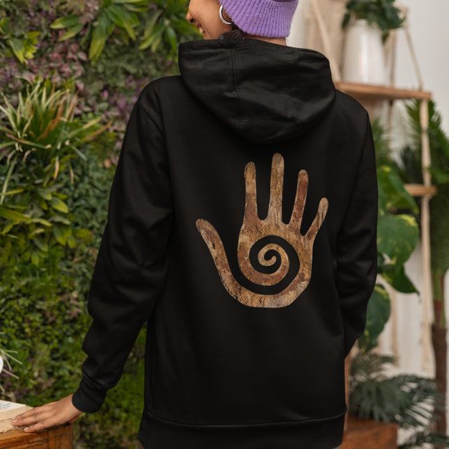 Native American healing hand spiral symbol on a black unisex pullover hoodie.