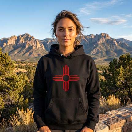 Red Zia Sun Symbol graphic on a black pullover hoodie.