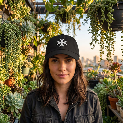 Black embroidered baseball cap featuring a white Maltese Cross symbol.