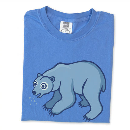 Goofy blue polar bear spitting snow graphic t-shirt design on an arctic animal tee.