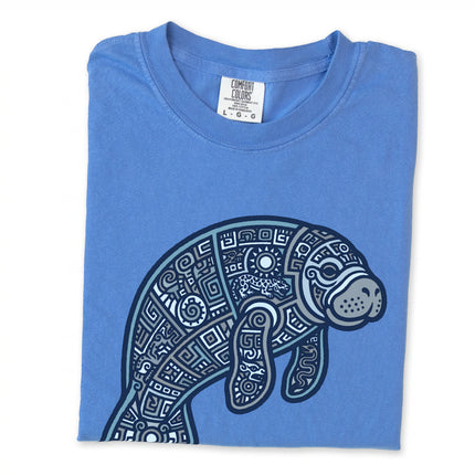 Geometric Mayan manatee graphic tee featuring tribal ocean animal art print.