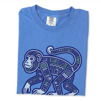 Mayan tribal monkey graphic tee featuring geometric symbols and ancient jungle art design.