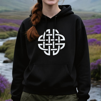 Black hoodie featuring a white Celtic knot symbol design. Unisex Irish culture apparel.