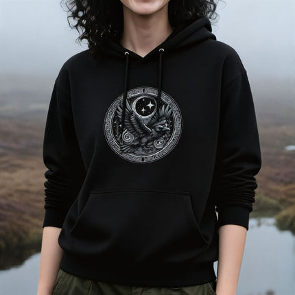 Norse raven hoodie featuring a circular graphic of a raven, moon, and Viking mythology art.