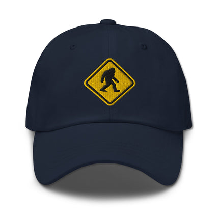 Embroidered Bigfoot crossing sign hat with sasquatch warning symbol embroidery.