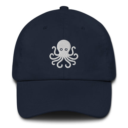 Embroidered octopus dad hat with nautical sea creature design on an unstructured baseball cap.