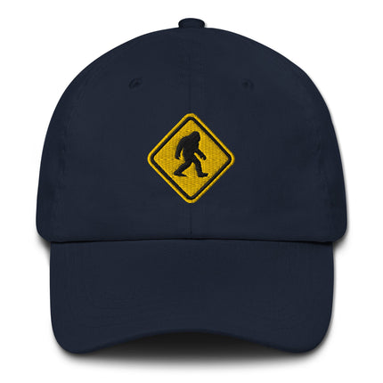 Embroidered Bigfoot crossing sign hat with Sasquatch warning symbol design cap.