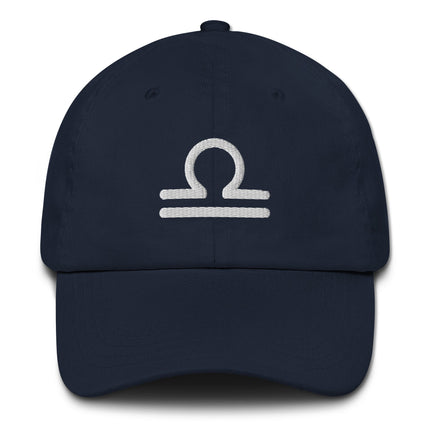 Embroidered Libra zodiac sign dad hat on unstructured cotton baseball cap.