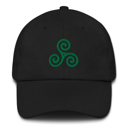 Embroidered Celtic triskelion hat in vibrant green Irish style.