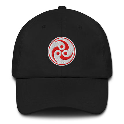 Red embroidered cap featuring Japanese Tomoe and Mitsudomoe symbols on a red baseball hat.
