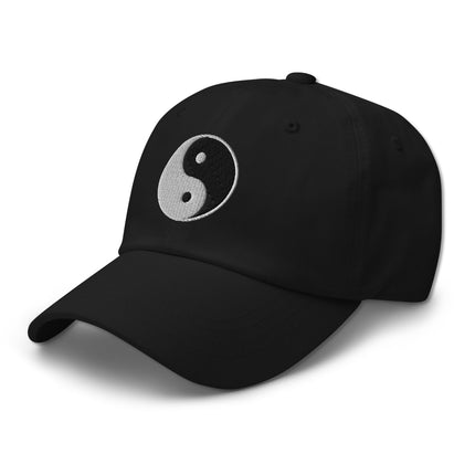 Embroidered yin and yang graphic dad hat, black baseball cap with symbolic design.